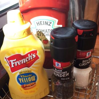 Rock 'N Fun - Condiments. Love the pepper/salt grinder! Lol. - Arcades Near Me - Kapolei, Hawaii