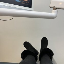 Esther Abraham, DDS - One of the patient rooms, equipped with movies to watch while you wait!