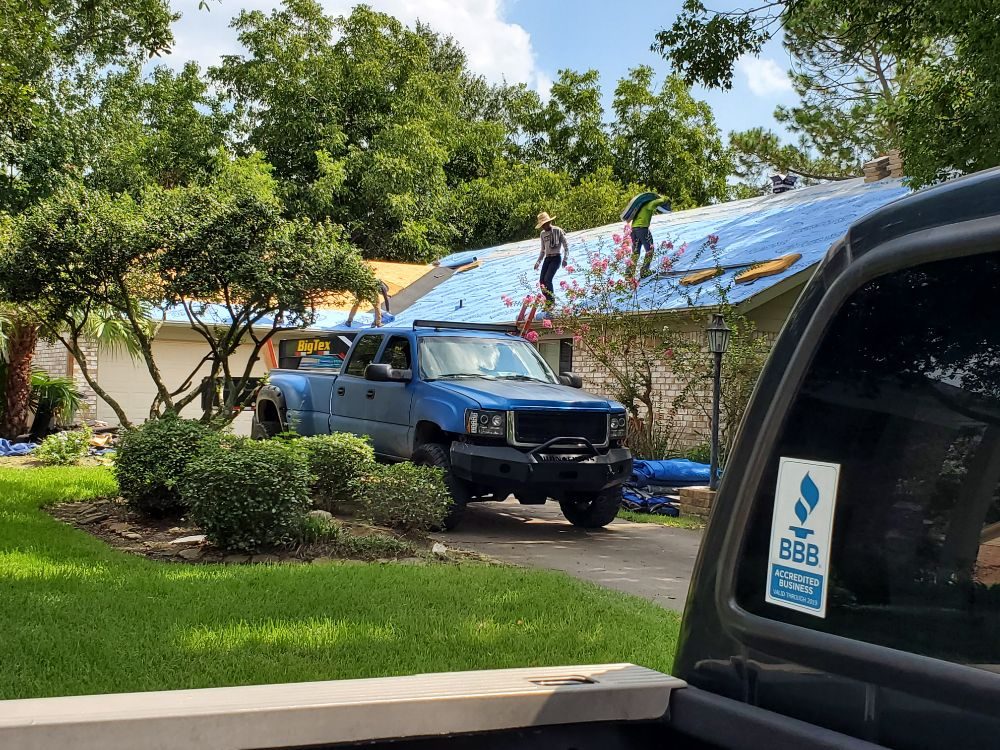 Slide of Mast Roofing & Construction