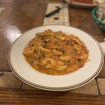 Cafe Sicilia - a plate of pasta on a table - Italian Near Me - Arlington, Texas Cafe Sicilia - a plate of pasta on a table - Italian Near Me - Arlington, Texas