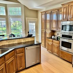 Landers Premier Flooring - New floors even helped our ancient cabinets look a little better!
