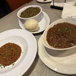 Got the cassava stew with fufu and red stew "chu" with jollof rice