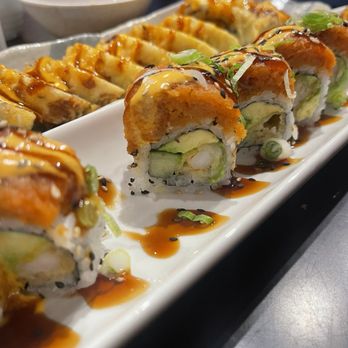 Sushi Time - Red Dragon Roll in front and Godzilla Roll in the background - Japanese Near Me - Martinez, California Sushi Time - Red Dragon Roll in front and Godzilla Roll in the background - Japanese Near Me - Martinez, California