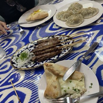 Silkroad Uzbek Cuisine - Cheese boat, kabobs, and dumplings - Uzbek Near Me - Cary, North Carolina