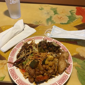 New China Restaurant - a plate of food on a table - Chinese Near Me - Porterville, California