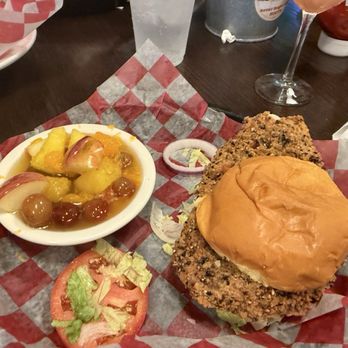 Roots Burger Bar - Disappointing side of fruit and black pepper coated pork tenderloin - American Near Me - Carmel, Indiana