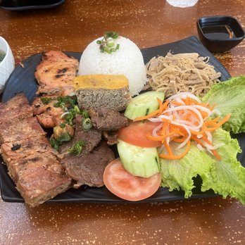Pho Time - Cơm tấm. Broken rice dish loaded with savory bbq meats. - Vietnamese Near Me - San Diego, California Pho Time - Cơm tấm. Broken rice dish loaded with savory bbq meats. - Vietnamese Near Me - San Diego, California