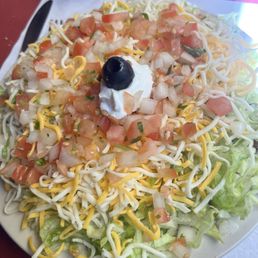 Tostada ( corn tortilla hidden underneath)
