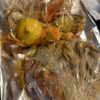 Happy Crab - comes in thick plastic bags, no worry of puncture! - Seafood Near Me - Somerville, Massachusetts