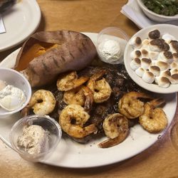 16oz prime rib and shrimp, baked sweet potato with Extra Honey Cinnamon Butter and brown sugar marshmallow