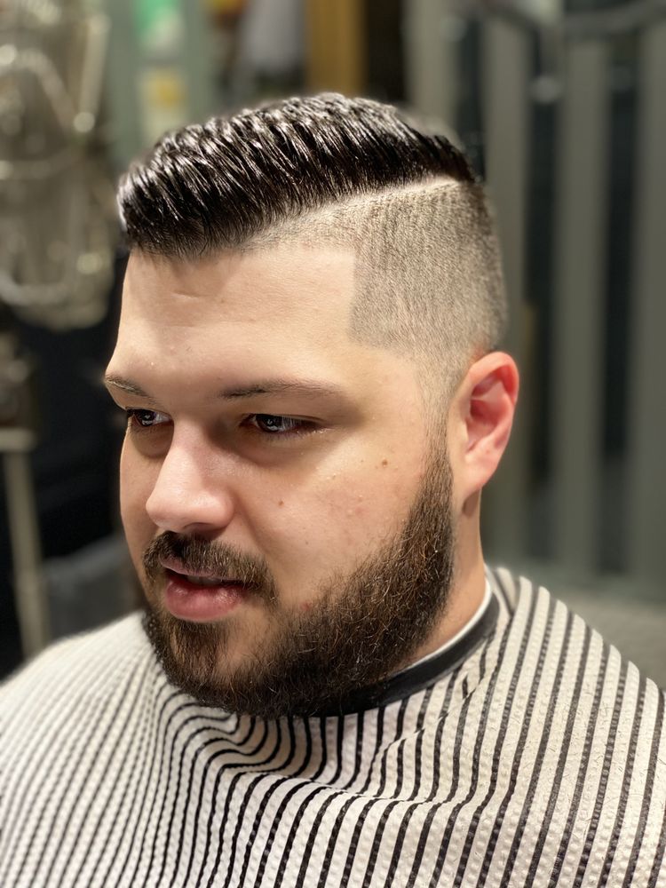 Resident Barber Logo
