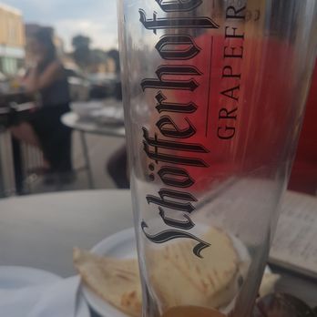 The Port Social - a glass of beer on a table - Bars Near Me - Port Perry, Ontario The Port Social - a glass of beer on a table - Bars Near Me - Port Perry, Ontario