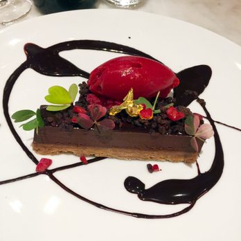 Wally's - DARK CHOCOLATE FONDANT hazelnut praline, nitro raspberry $12 - New American Near Me - Beverly Hills, California Wally's - DARK CHOCOLATE FONDANT hazelnut praline, nitro raspberry $12 - New American Near Me - Beverly Hills, California