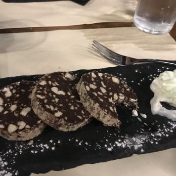 Nevodi - Dessert dark chocolate "salami". It real salami but shaped Like it. Tastes delicious - Bars Near Me - Venezia, VE Nevodi - Dessert dark chocolate "salami". It real salami but shaped Like it. Tastes delicious - Bars Near Me - Venezia, VE