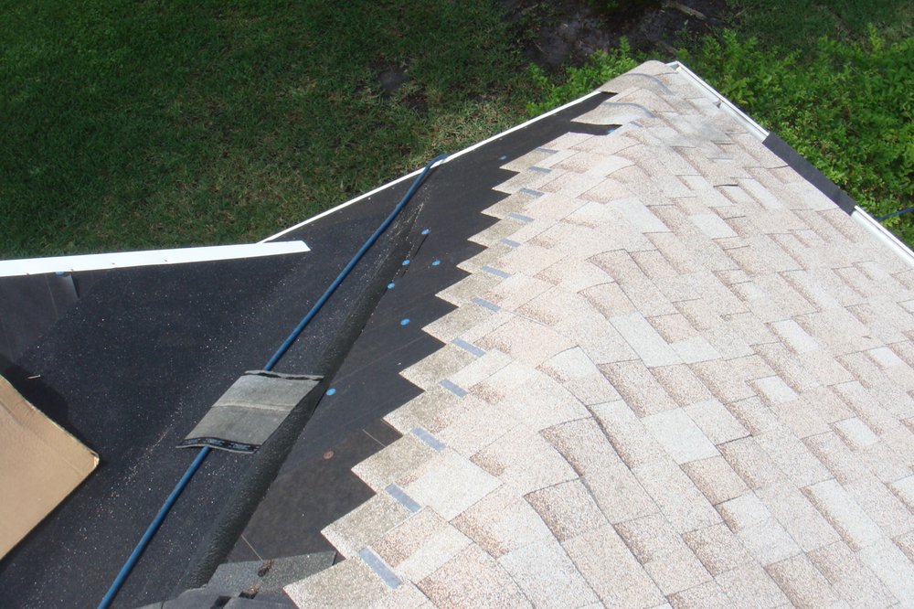 Slide of Rizzo Roofing