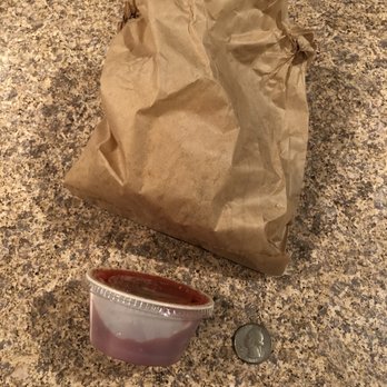 La Fiesta Mexican Cocina Ormond Beach - Pictured: small bag of tortilla chips and little cup of salsa. Quarter for size reference. - Mexican Near Me - Ormond Beach, Florida La Fiesta Mexican Cocina Ormond Beach - Pictured: small bag of tortilla chips and little cup of salsa. Quarter for size reference. - Mexican Near Me - Ormond Beach, Florida