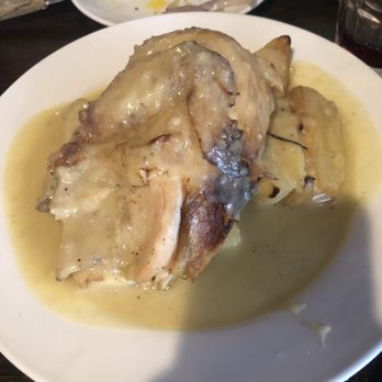 Kiki's - Mama's Oven - Roasted Chicken. Tasted much better than it looks. The Roasted Lemon Potatoes underneath were so good! - Greek Near Me - New York, New York