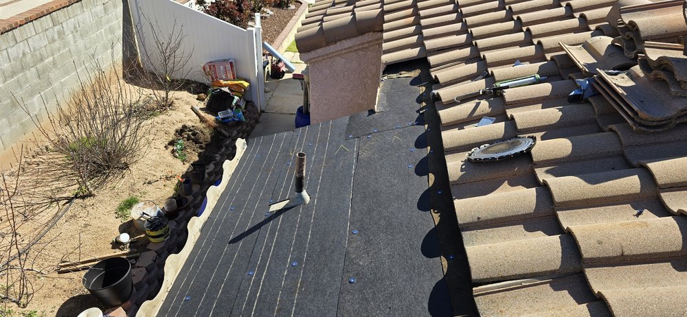 Slide of JB Roofing Solutions