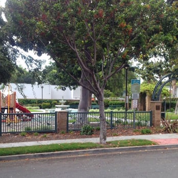 Raymond Arbor Park - View of the small park from the street. - Parks Near Me - Signal Hill, California