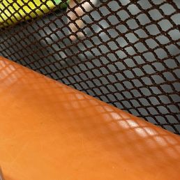 Kid wearing no socks in front play area