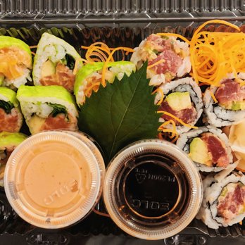 Sushi Nanami - a plastic container filled with sushi - Sushi Bars Near Me - Montreal, Quebec