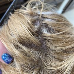 Roots growing out after she fried my hair