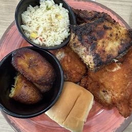 Fried chicken, roasted chicken, plantains, rice Fried chicken, roasted chicken, plantains, rice