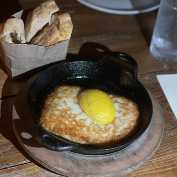 Mandolin Aegean Bistro - Cheese Saganaki - Mediterranean Near Me - Miami, Florida Mandolin Aegean Bistro - Cheese Saganaki - Mediterranean Near Me - Miami, Florida