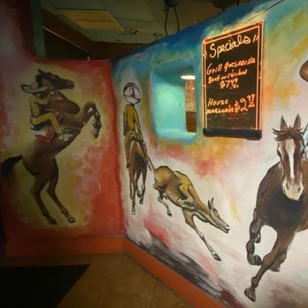 El Potro Mexican Restaurant - a mural of a cowboy on horseback - Mexican Near Me - Jacksonville Beach, Florida El Potro Mexican Restaurant - a mural of a cowboy on horseback - Mexican Near Me - Jacksonville Beach, Florida