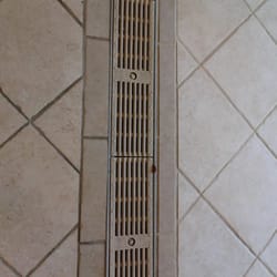 Pro Grout and Tile Restoration - left side bfore right side after result