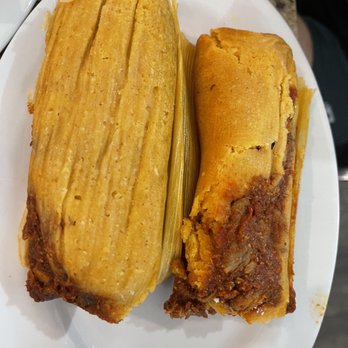 Mi Gente Taqueria - Pork Tamales (cheese and salsa on the side) - Latin American Near Me - Destin, Florida Mi Gente Taqueria - Pork Tamales (cheese and salsa on the side) - Latin American Near Me - Destin, Florida