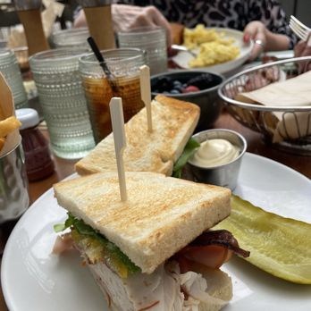 Salt & Ivy - Club sandwich on sour dough with organic turkey ham and bacon with heirloom tomatoes and Bibb lettuce - New American Near Me - Las Vegas, Nevada