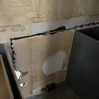 Elite Rooter - This is how they decided to pass a fridge water line - Plumbing Near Me - Tampa, Florida