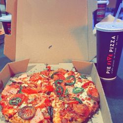 Pie Five Pizza - Personal pan pizza with spicy sauce, mozzarella, pepperoni, ham, bacon, and jalapeños. Fountain drink.
