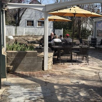Root Food + Wine - The rear patio was open for dining. - New American Near Me - Augusta, Missouri