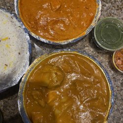 Natraj Cuisine of India - Butter chicken, chicken madras and rice. This green sauce is so good too!!