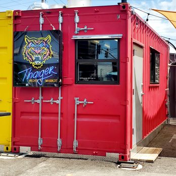 Thaiger Kc - a red container with a neon tiger sign - Thai Near Me - North Kansas City, Missouri Thaiger Kc - a red container with a neon tiger sign - Thai Near Me - North Kansas City, Missouri