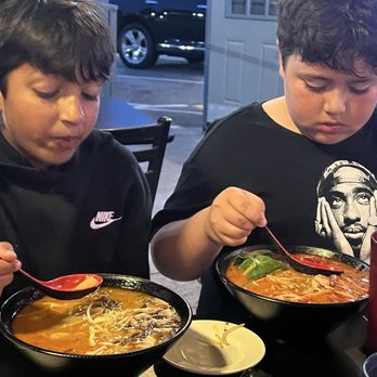 Jinme Ramen & Sushi Bar - My Son is Friend enjoying the Ramen.  There is  specific Ramen made with vegetable broth, - Sushi Bars Near Me - Auburn, California