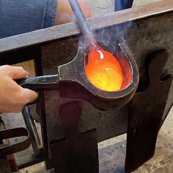 Moana Glass by Ryan Staub - Smoothing out the molten glass - Art Galleries Near Me - Lahaina, Hawaii