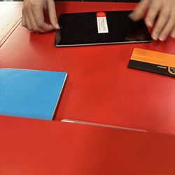 JB Fix - Harry installing a new screen protector on our little ones iPad