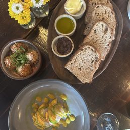 You can watch the amazing bread being made from your table. Halibut crudo and their take on a Scotch Egg, inspired by huevos rancheros. You can watch the amazing bread being made from your table. Halibut crudo and their take on a Scotch Egg, inspired by huevos rancheros.