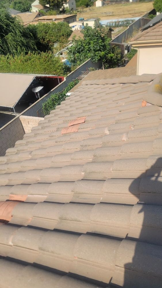 Slide of Jose Roofing Service