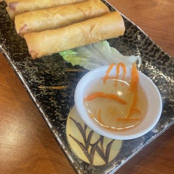Huong Duong - Fried egg rolls with 1 gobbled already - Vietnamese Near Me - Seattle, Washington Huong Duong - Fried egg rolls with 1 gobbled already - Vietnamese Near Me - Seattle, Washington