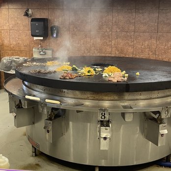 Khan's Grill - a grill with a lot of food on it - Mongolian Near Me - Pharr, Texas