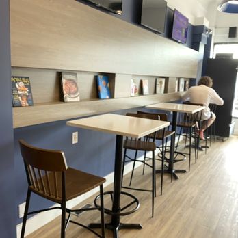 KŌN Artisan Ice cream - a man sitting at a counter - Ice Cream & Frozen Yogurt Near Me - Estevan, Saskatchewan