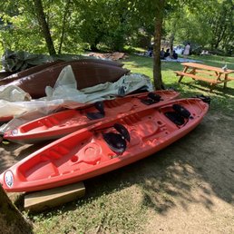 The tandem kayaks. Grassy area, and end of driveway entrance on the right top.