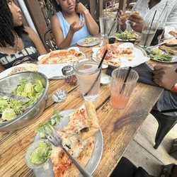 Hildee's - Cesar salad cheese pizza and meat lovers.