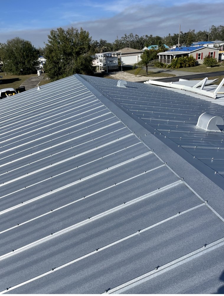 Slide of ARK Roofing