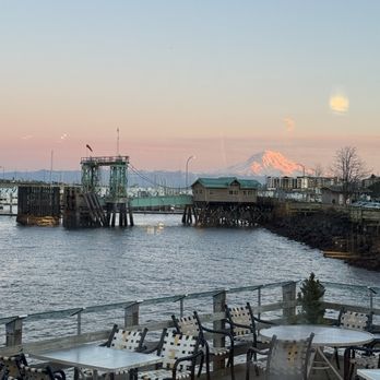 Anthony's - View of water, sunset, and mount Rainier in the background from our table - Seafood Near Me - Tacoma, Washington Anthony's - View of water, sunset, and mount Rainier in the background from our table - Seafood Near Me - Tacoma, Washington