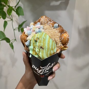 Puffles - BYO Pistachio Single Scoop with Mochi, Graham Cracker Crumbs and Caramel Drizzle - Desserts Near Me - Hollywood, Florida Puffles - BYO Pistachio Single Scoop with Mochi, Graham Cracker Crumbs and Caramel Drizzle - Desserts Near Me - Hollywood, Florida